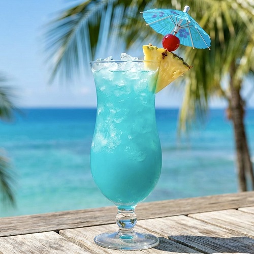 A vibrant Blue Hawaiian cocktail in a hurricane glass.